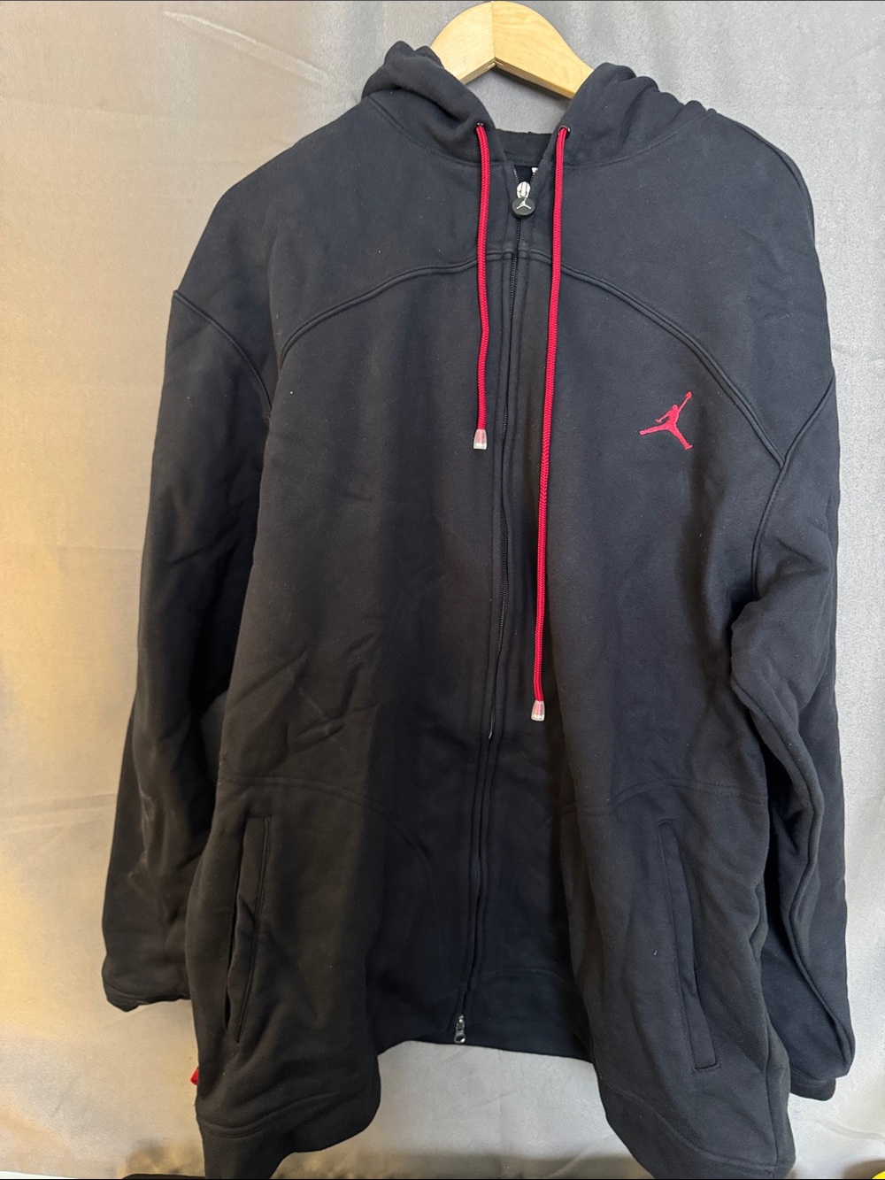 Jordan Black Zip Hoodie with Red Accent Logo and Drawstrings